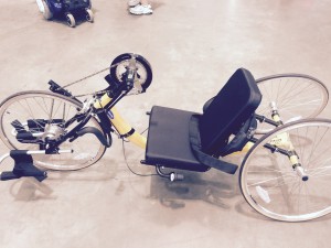 Racing-style wheelchair with hand pedals